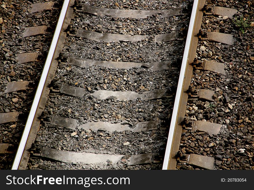 The part of railroad, rail, cross tie, gravel, train way, Bolt and nut