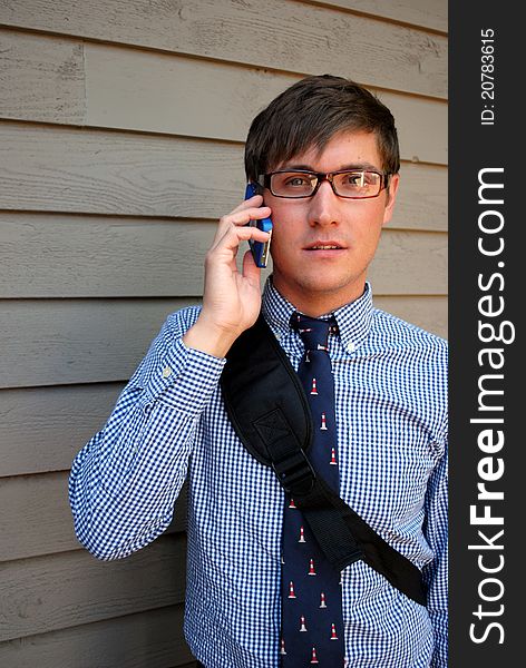 A young business man on the phone