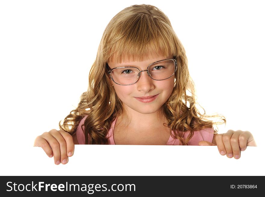 Smiling girl holding white  sheet of a paper, isolated on white. Smiling girl holding white  sheet of a paper, isolated on white