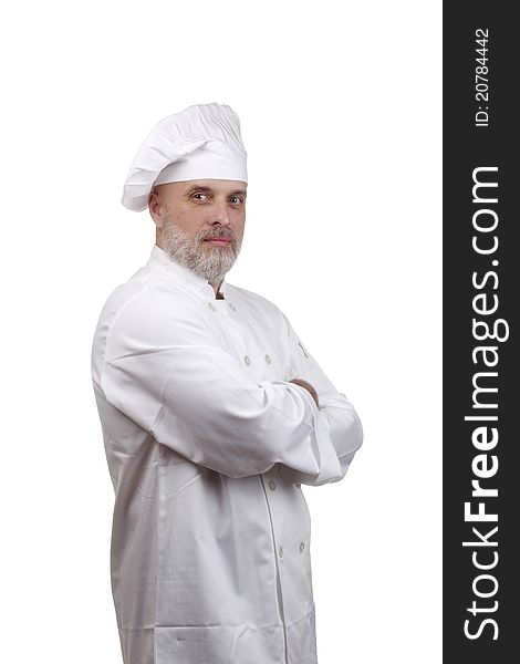 Portrait of a chef in a chef's hat and uniform isolated on a white background.