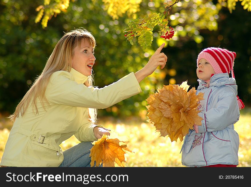 Young woman and child in park