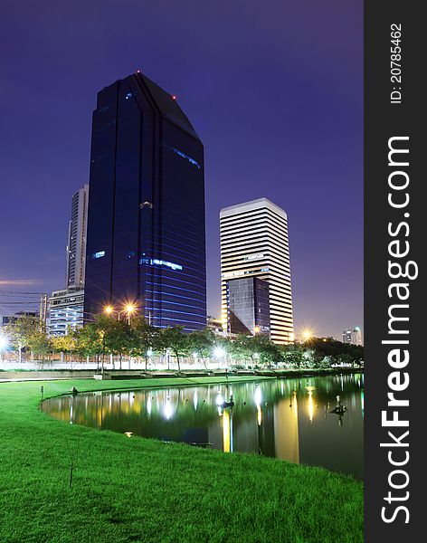 Modern buildings in the park at night of Bangkok, thailand. Photo taken on: August 13th, 2011