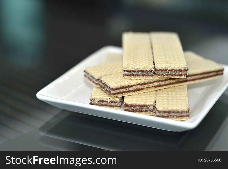 Chocolate wafers placed on a plate.