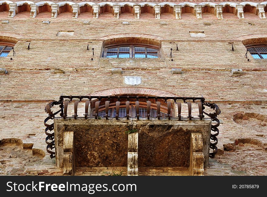 Medieval wall with old balcony. Medieval wall with old balcony