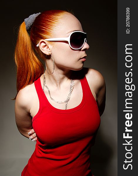 Portrait of funky white rapper chick in sunglasses. Portrait of funky white rapper chick in sunglasses