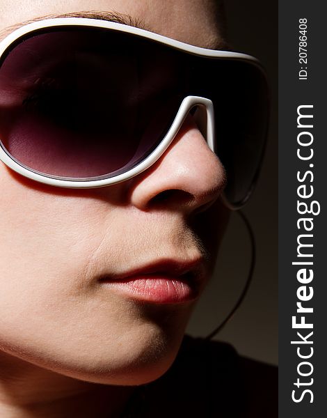 Portrait of funky white rapper chick in sunglasses. Portrait of funky white rapper chick in sunglasses