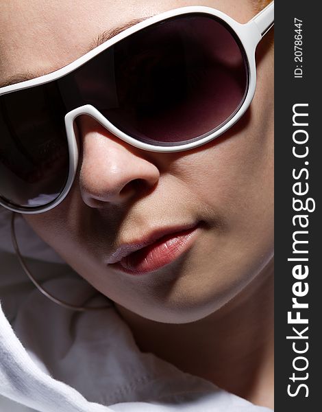 Portrait of funky white rapper chick in sunglasses. Portrait of funky white rapper chick in sunglasses