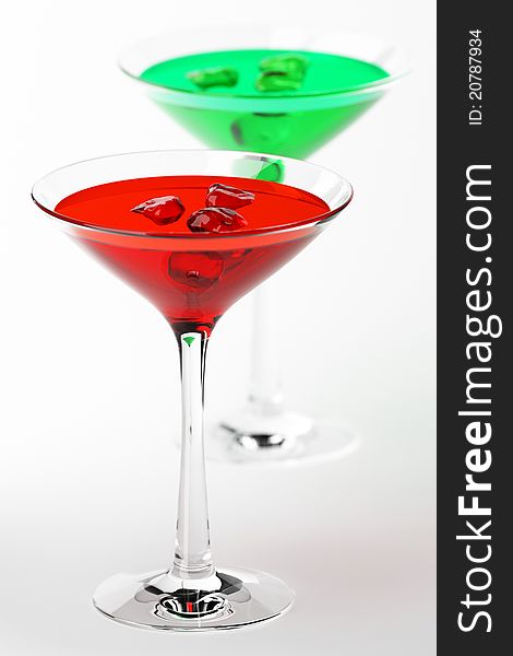 Martini glass with red and green coctails on white background. Martini glass with red and green coctails on white background