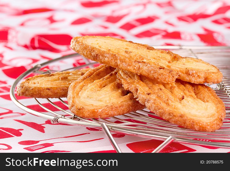 Puff pastry cookies glazed with sugar.