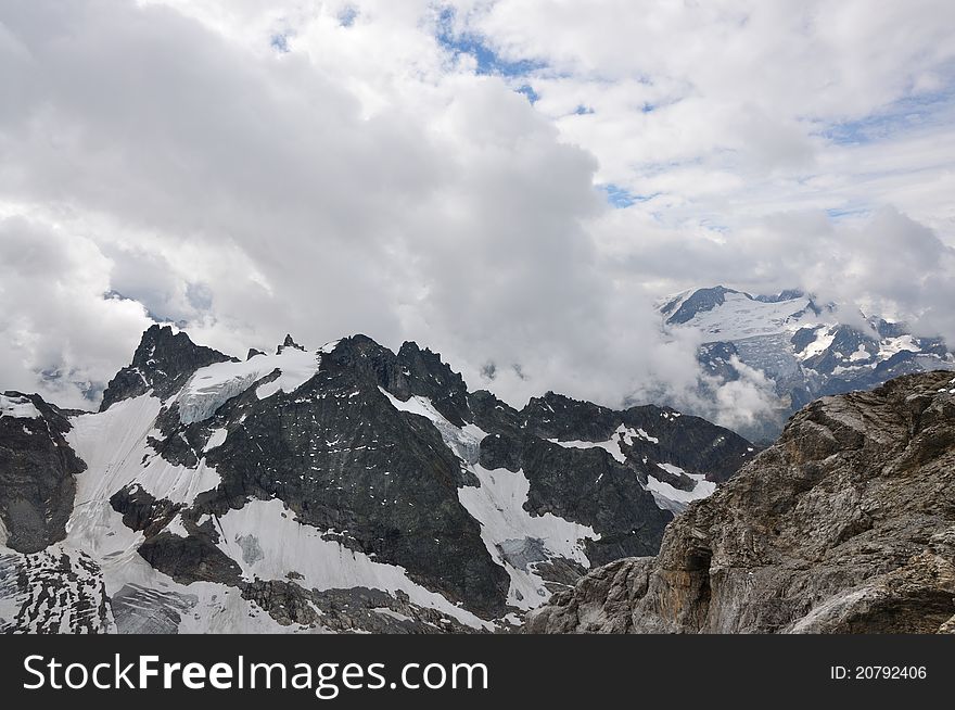 Among Clouds In Alps