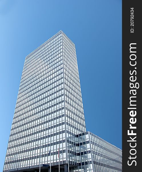 Steel and Glass Office Block under a blue sky. Steel and Glass Office Block under a blue sky