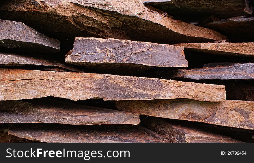 Stone pieces used in construction in a stack