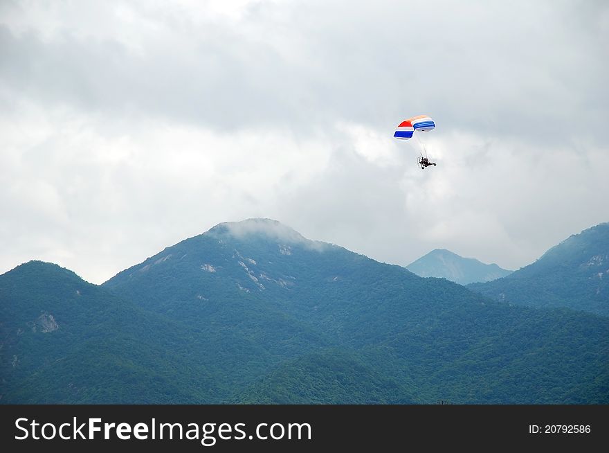 Powered parachute over the mountains. Powered parachute over the mountains.