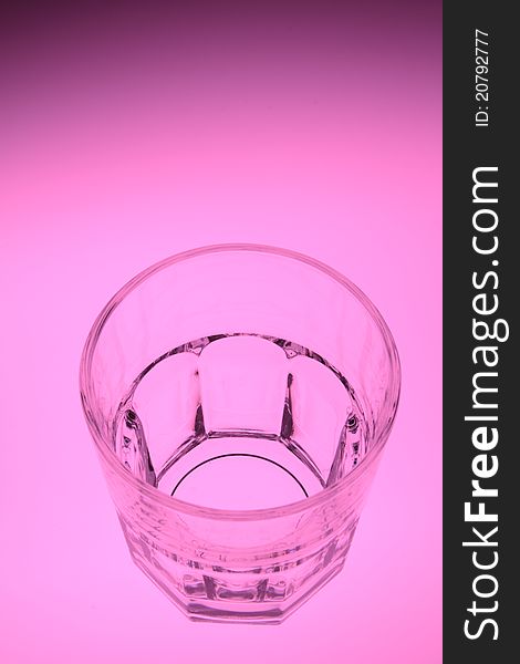 A glass cup with white background.