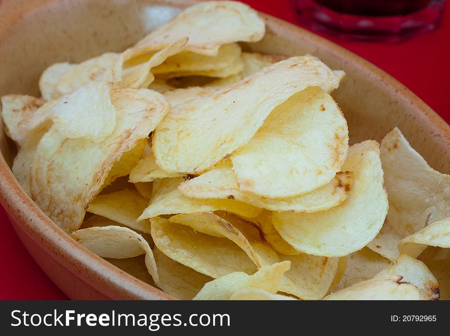 Potato chips and cola for snacks and appetizers. Potato chips and cola for snacks and appetizers
