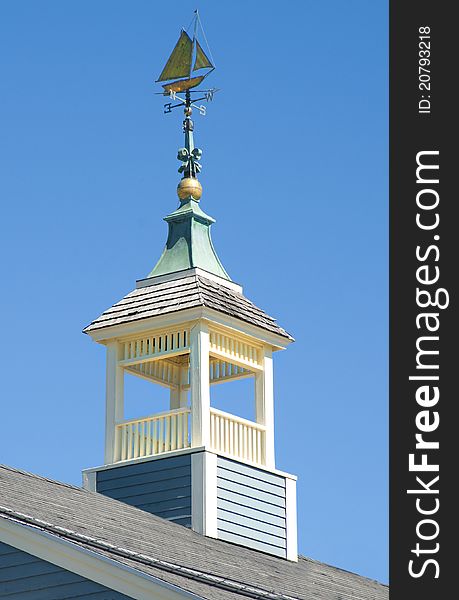 Weathervane in the form of a sailing ship on a roof cupola