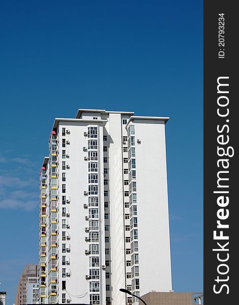 Buildings for residence with blue sky.