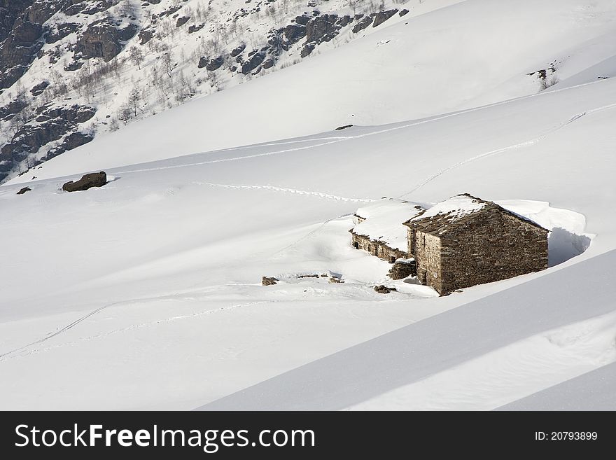 Mountain cabin in the snow