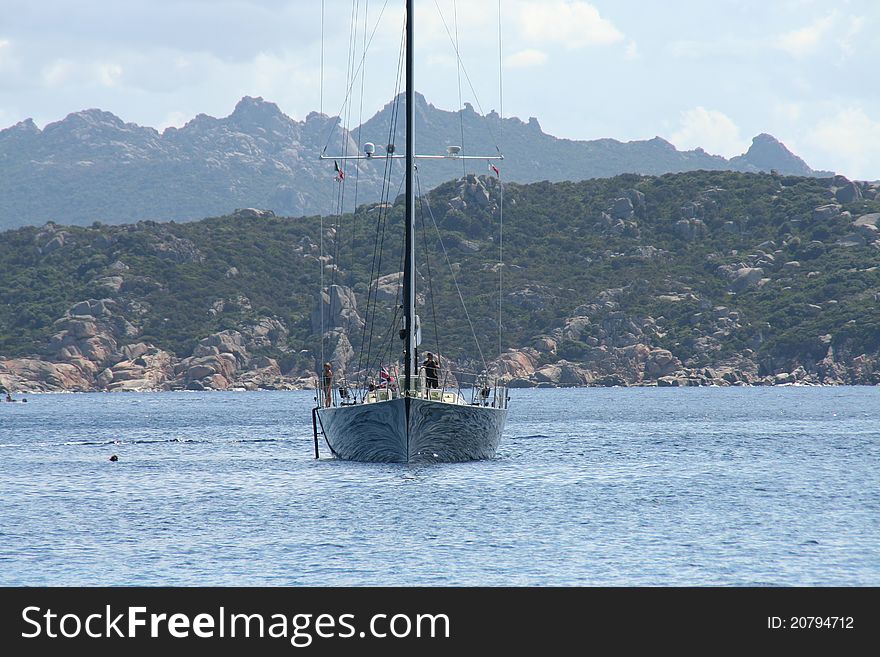 Race yacht anchoring in the Maddalena Archipelago, Sardinia. Race yacht anchoring in the Maddalena Archipelago, Sardinia.