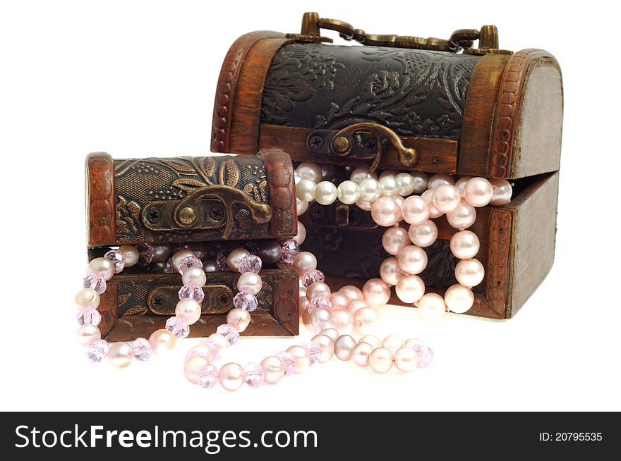 Two wooden chest with pearl necklace , isolated on white. Two wooden chest with pearl necklace , isolated on white