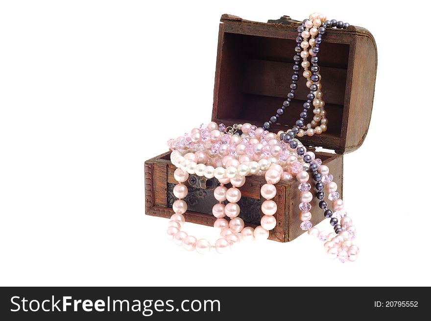 Wooden chest with pearl necklace , isolated on white. Wooden chest with pearl necklace , isolated on white