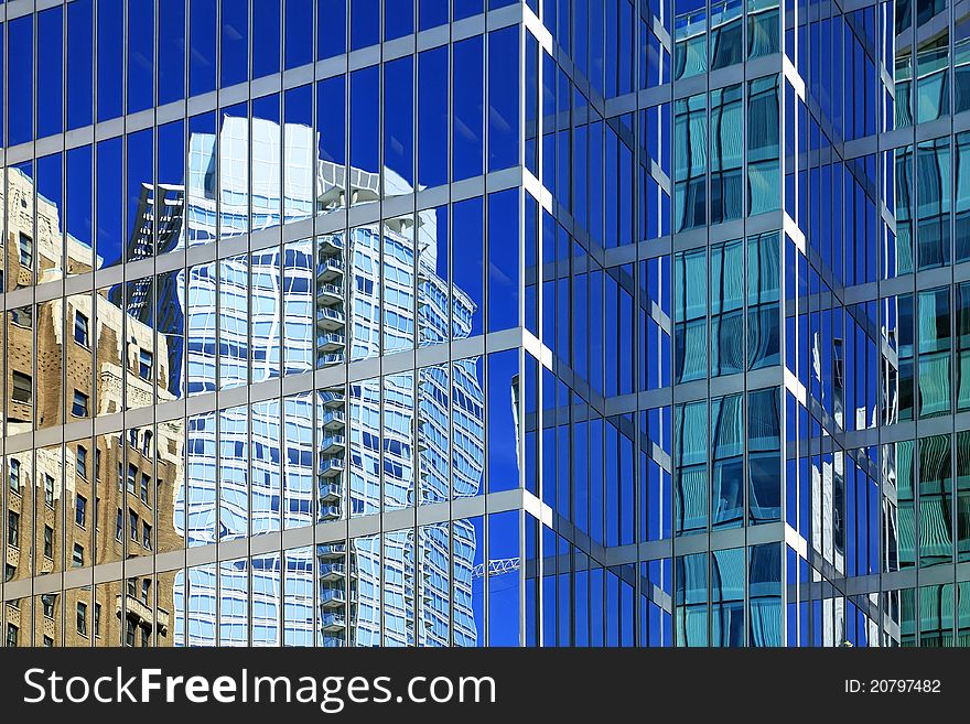 Reflections in windows of modern office buildings