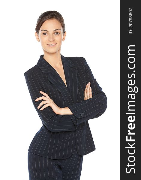 Positive young business woman standing with folded hands, isolated on white background