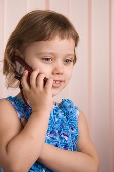 Little Girl Talking At Phone Royalty Free Stock Photography Little Girl Talking At Phone Royalty Free Stock Photography