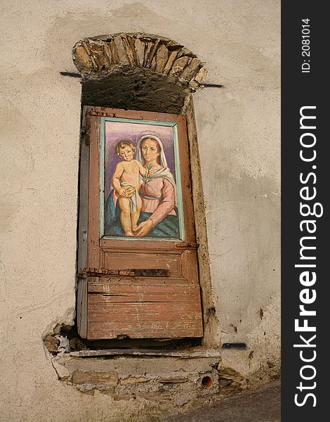 Artistic painting doors in the medieval village, Italy