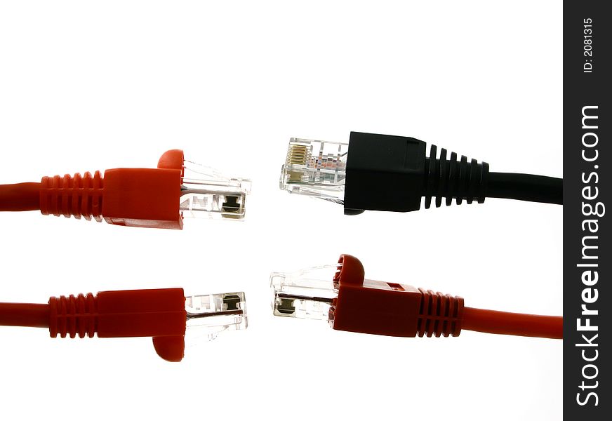 Couples of red and black RJ45 endings against each other on the white back ground. Couples of red and black RJ45 endings against each other on the white back ground