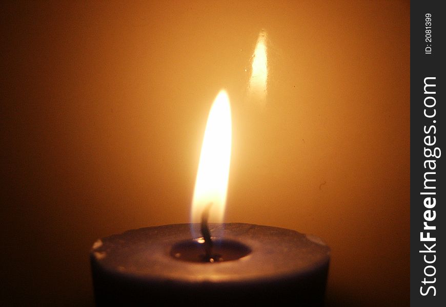Burning candle in darkness (the second candle). Burning candle in darkness (the second candle)