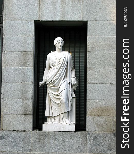 White statue on the building in Madrid. White statue on the building in Madrid