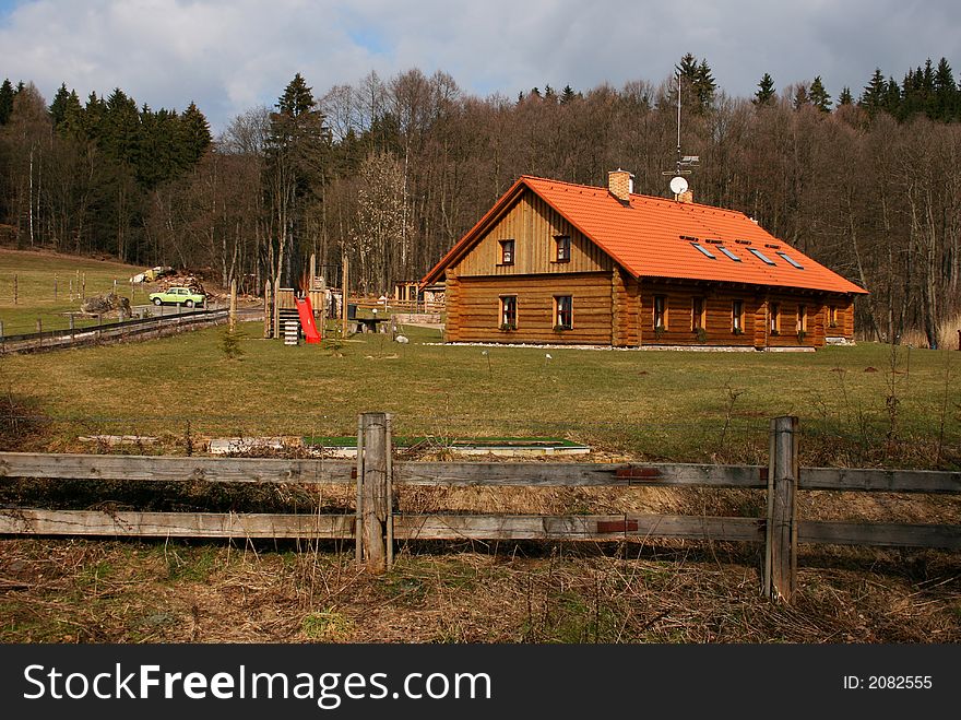 Wooden house standing on the meadow. Wooden house standing on the meadow