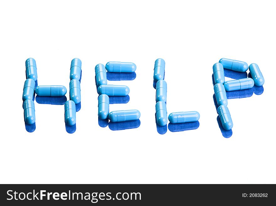 An arrangement of blue pills spelling out HELP. An arrangement of blue pills spelling out HELP