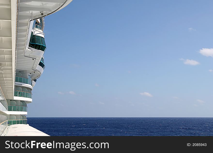 View of the side of a ship with ocean and negative space for copy. View of the side of a ship with ocean and negative space for copy