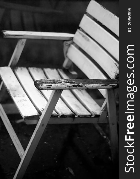 Old white wooden chair in black and white. Old white wooden chair in black and white.