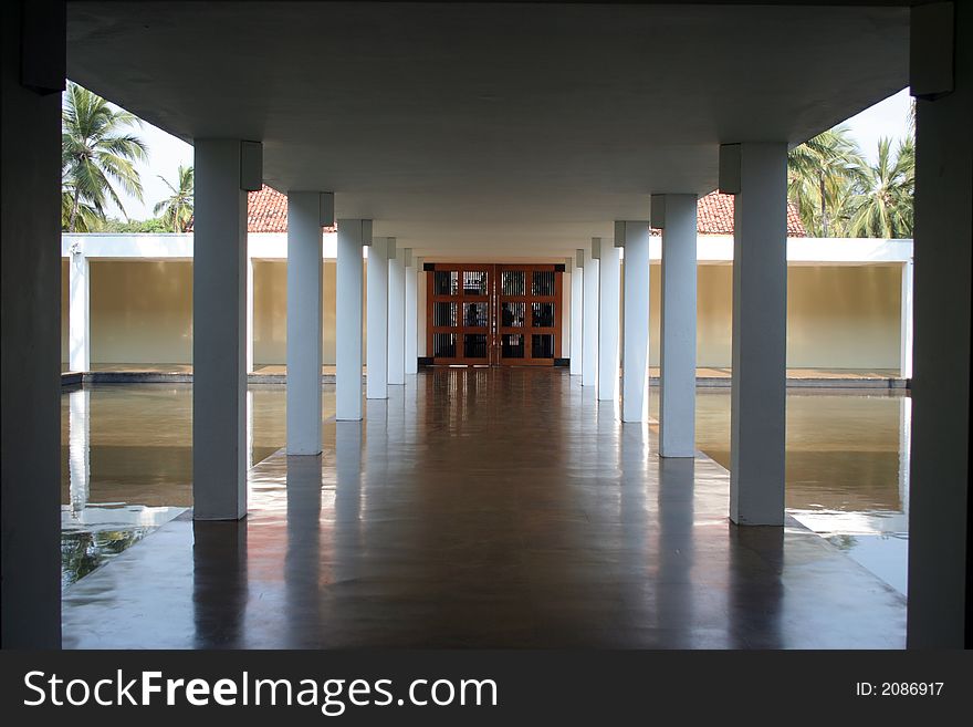 A corridor of a hotel in a tropical country. A corridor of a hotel in a tropical country.