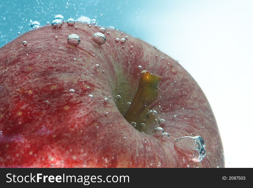 Fresh red apple and water bubbles. Fresh red apple and water bubbles