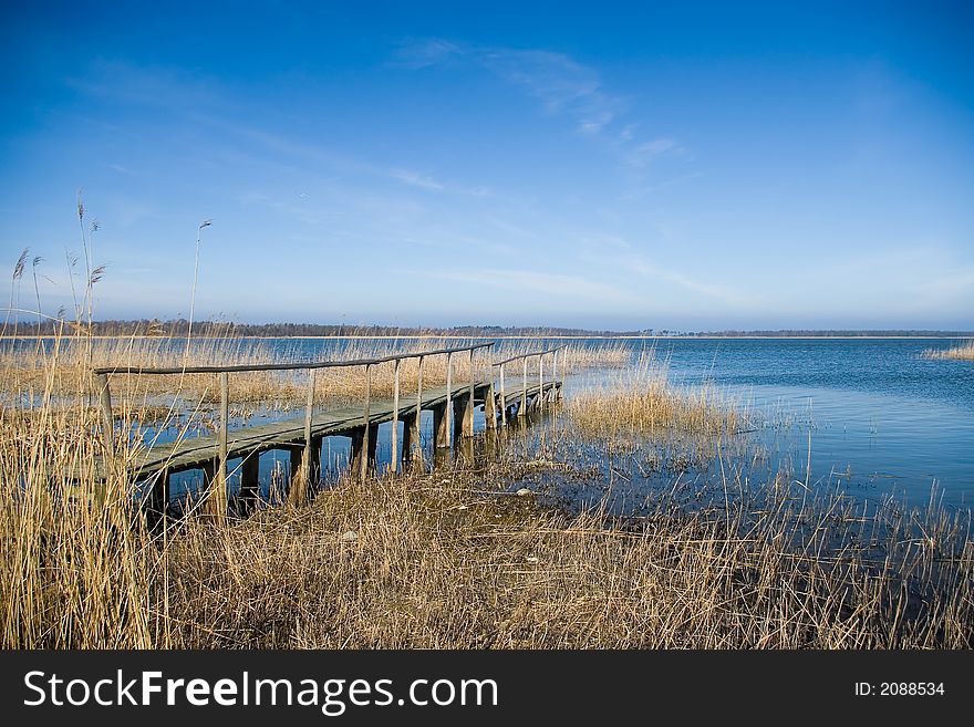 Wooden jetty at lake.