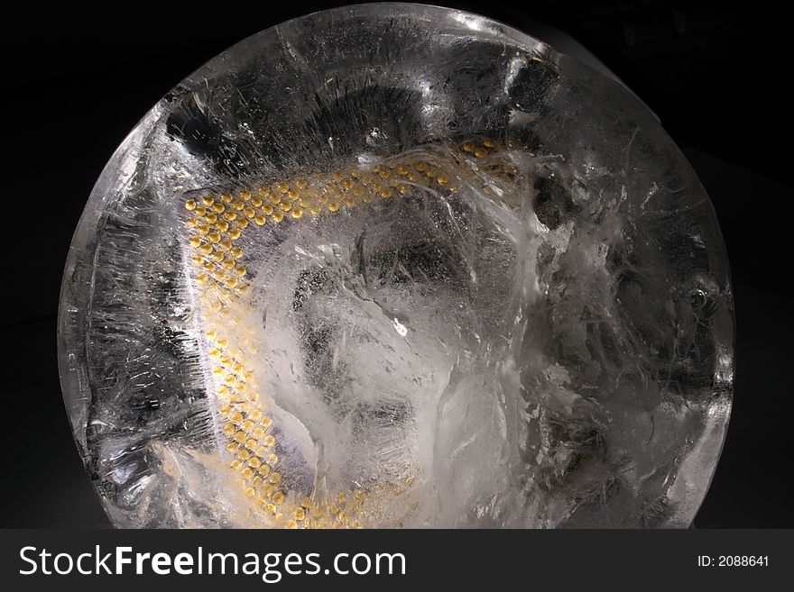 Ice sphere with frozen processor inside. Ice sphere with frozen processor inside