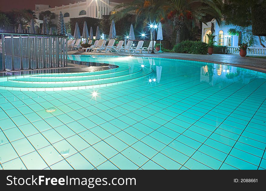 Photo of huge swimming pool at night. Photo of huge swimming pool at night
