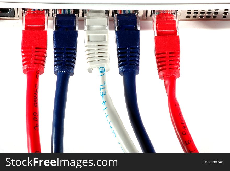 Network cable in three diferent colors in a router. Network cable in three diferent colors in a router