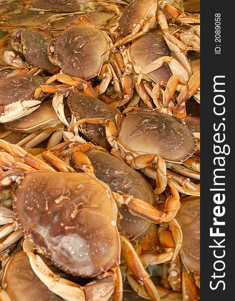 Crabs together in basket on asian market