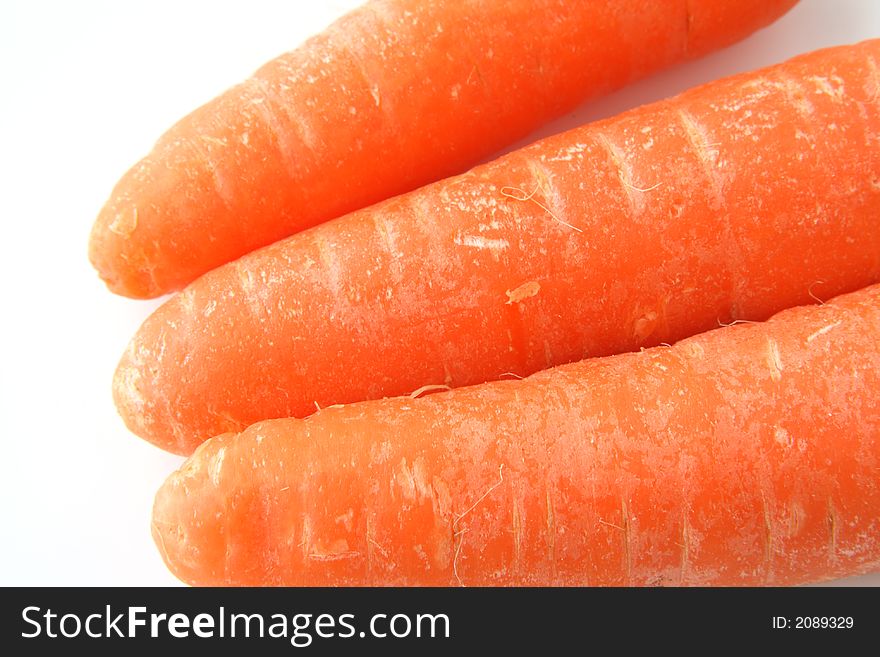 Carrots on the background clouseup. Carrots on the background clouseup