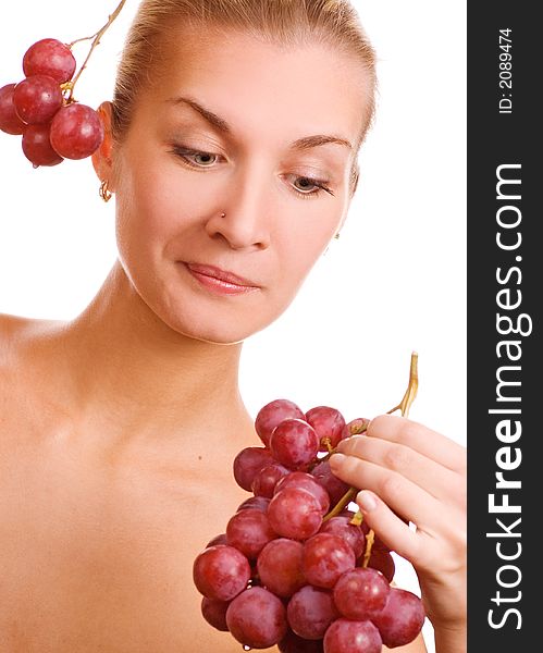 Picture of a Beutiful young girl with a bunch of grapes