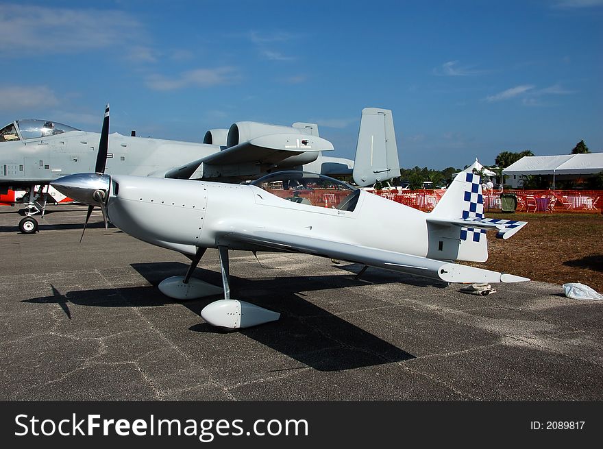 Light acrobatic airplane in gray color