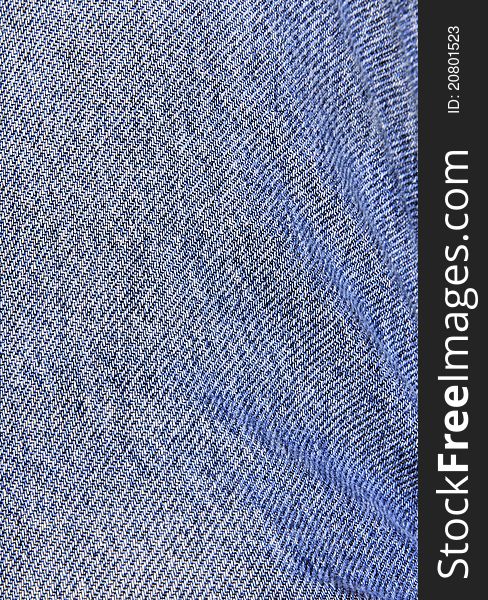 Worn denim jeans shot at macro to expose patterns. Worn denim jeans shot at macro to expose patterns.