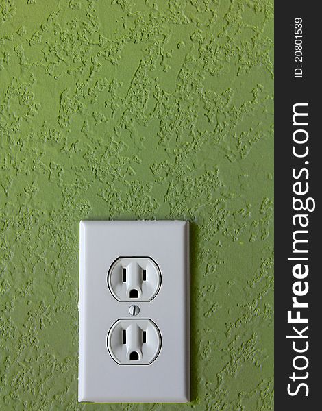 Single outlet on a green background. Single outlet on a green background.