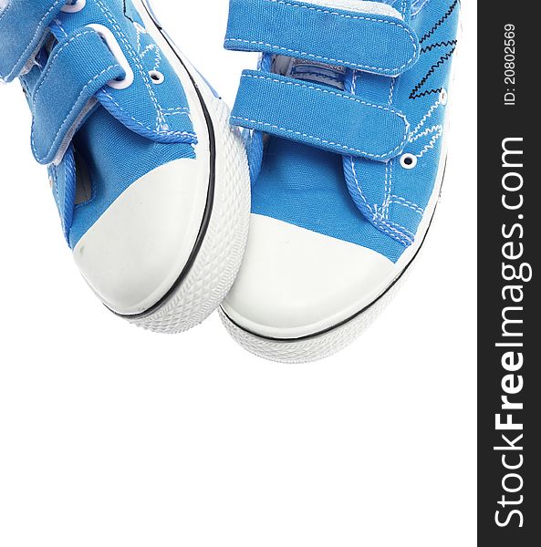 Blue sneakers isolated on white background