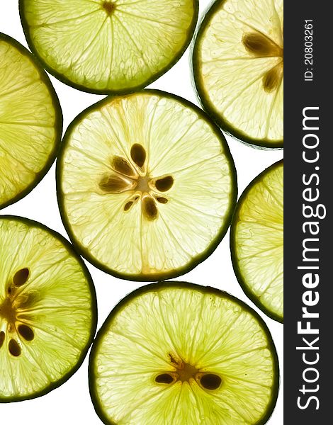 Pieces of lime on white background